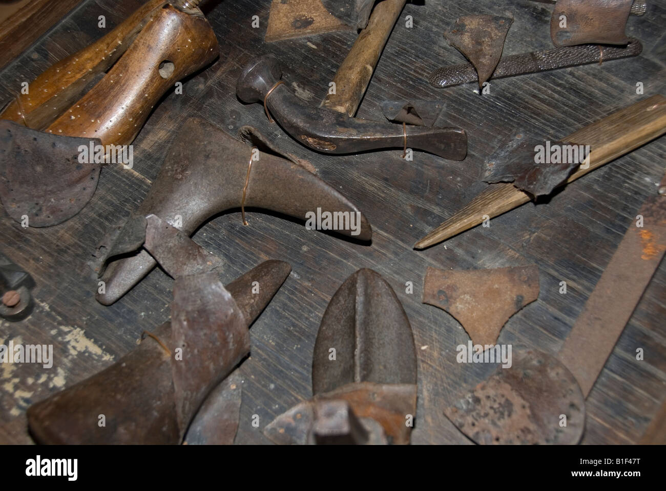Stock photo of various old tools used to make shoes and boots in the village of Montrol Senard Stock Photo
