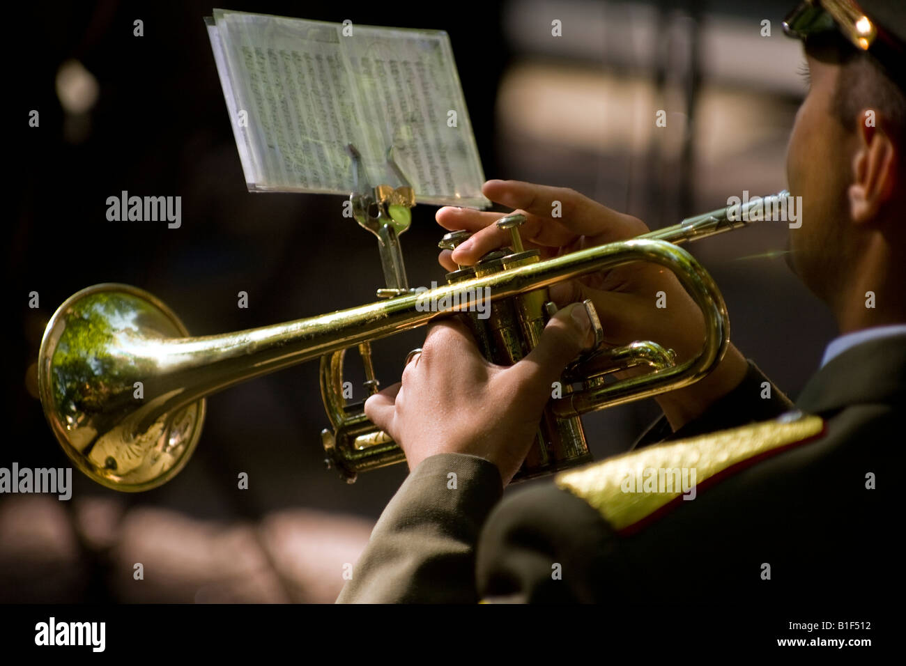 Trumpeter plays at the street concert of Lithuanian Armed Forces Band in St Petersburg Russia Stock Photo