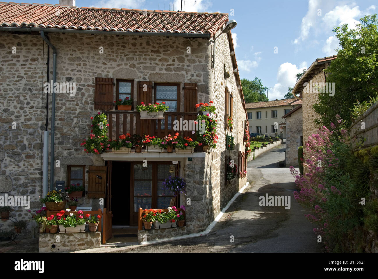 Stock photo of a pretty house in the village of Montrol Senard Montrol Stock Photo