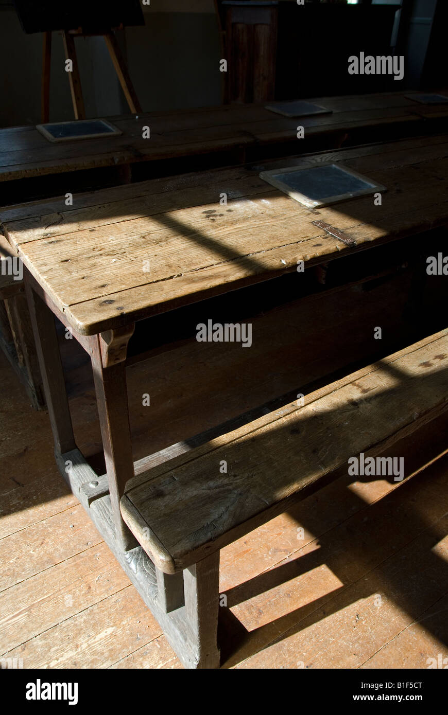 Stock photo of old desks and benches in the renovated school in the village of Montrol Senard Stock Photo