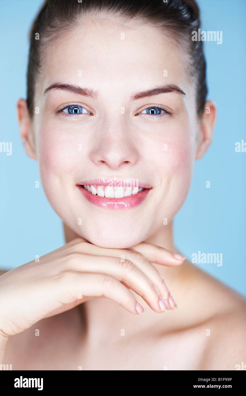 Portrait of young smiling woman Stock Photo - Alamy