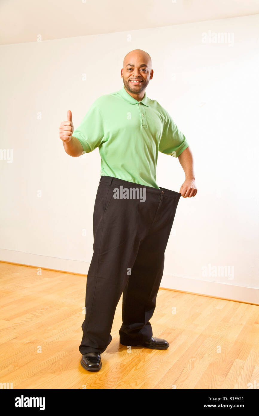 Man displaying pants hi-res stock photography and images - Alamy