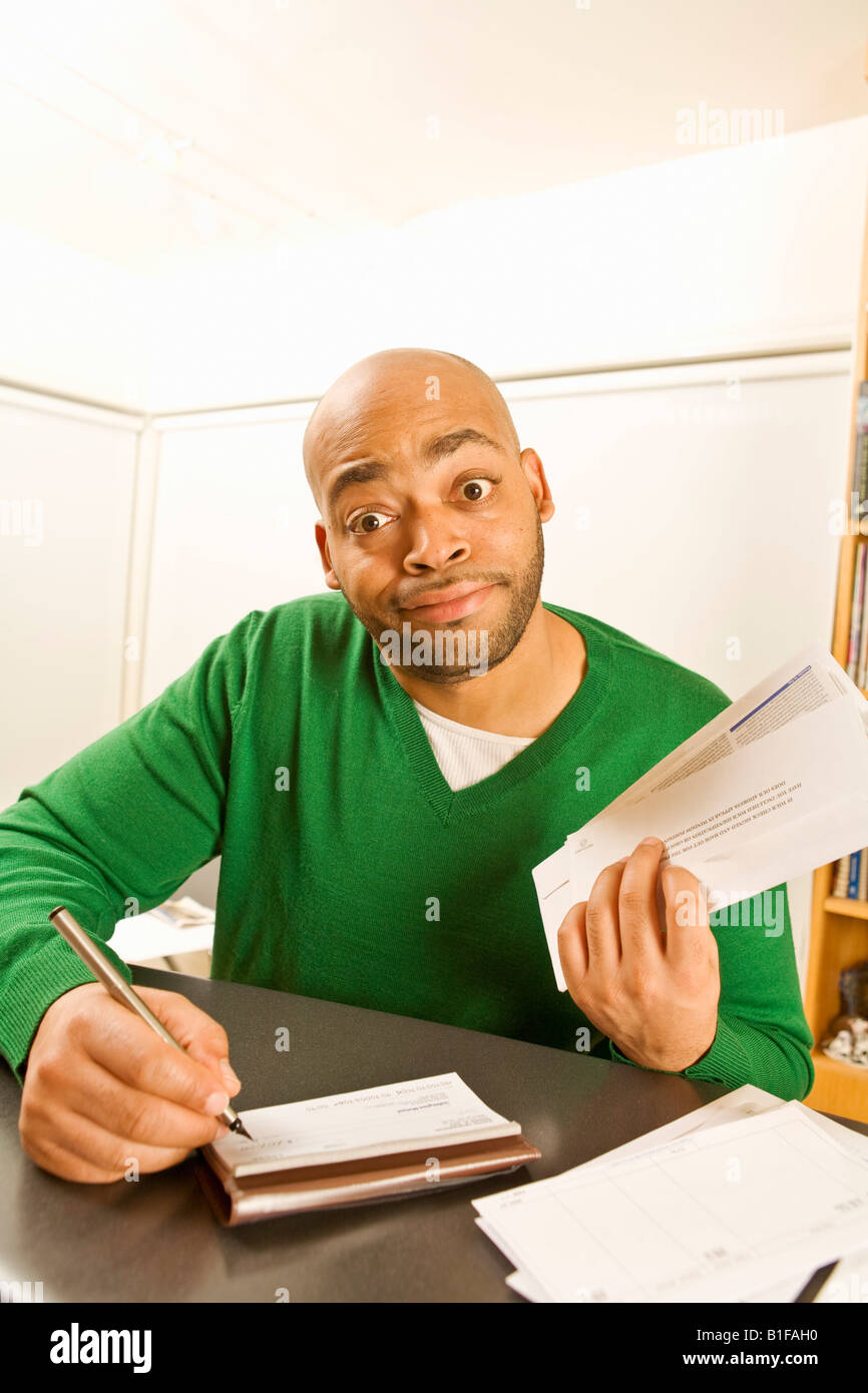 Man Write Check Humor writing hi-res stock photography and images - Alamy