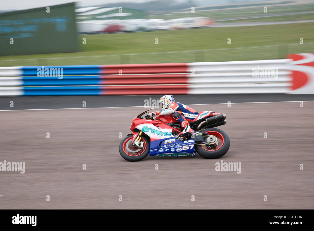 Shane (Shakey) Byrne riding an Airwaves Ducati on the pit straight at Thruxton during practice for the BSB Championship Stock Photo