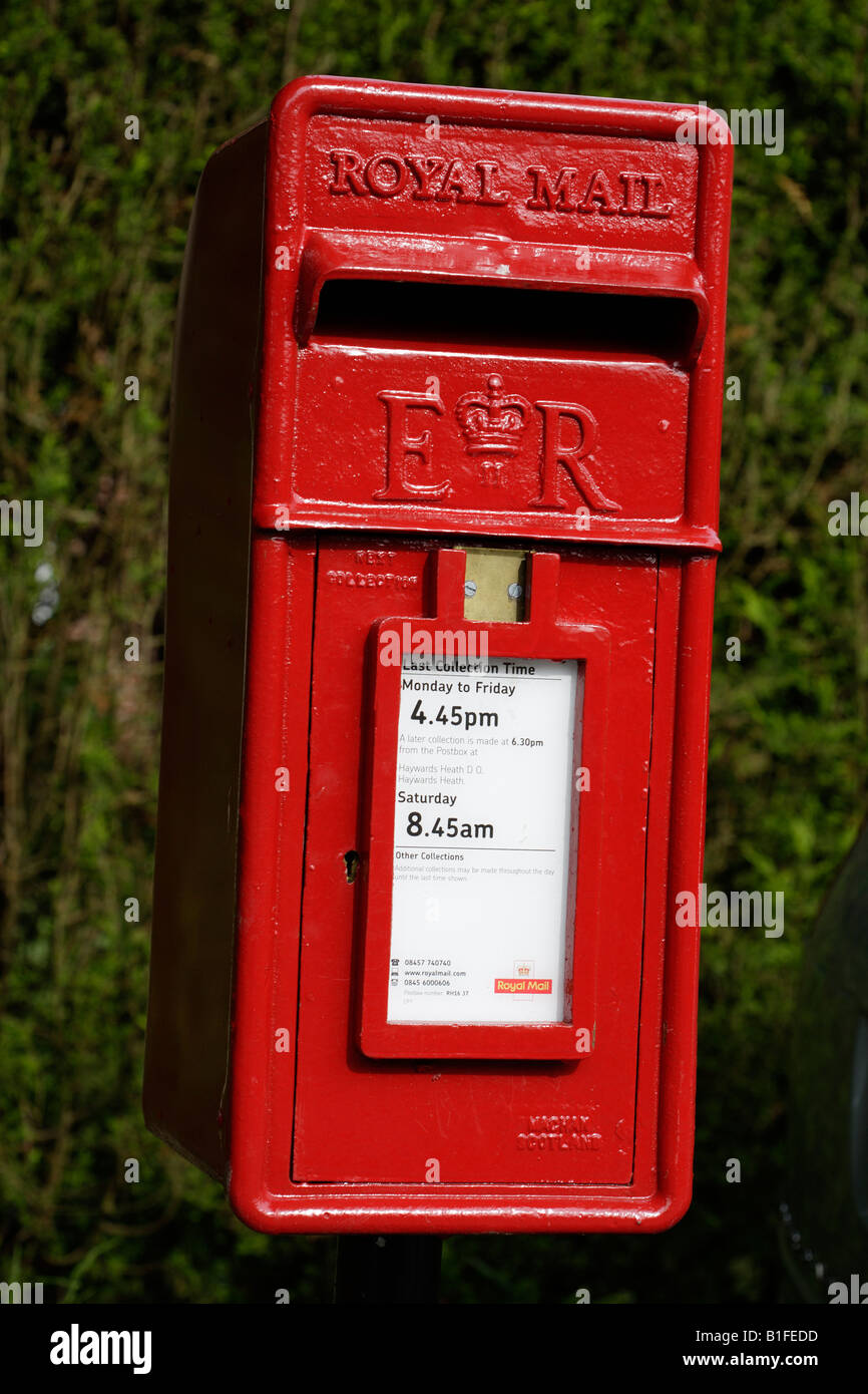 Red British posting box Public mailbox Stock Photo Alamy