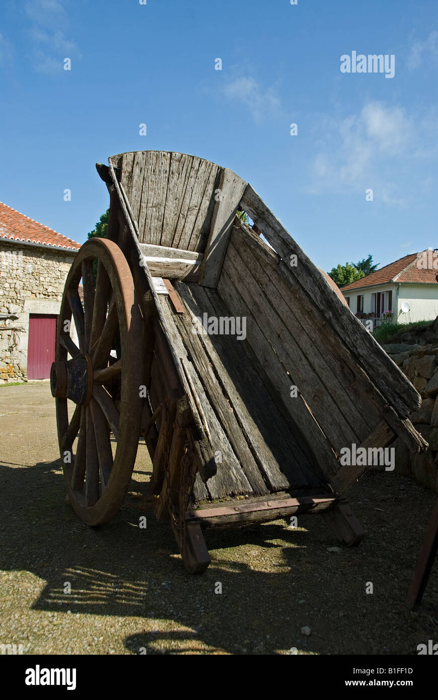 Stock photo of an old wooden cart in the French village of Montrol Senard in the Limousin region of France Stock Photo