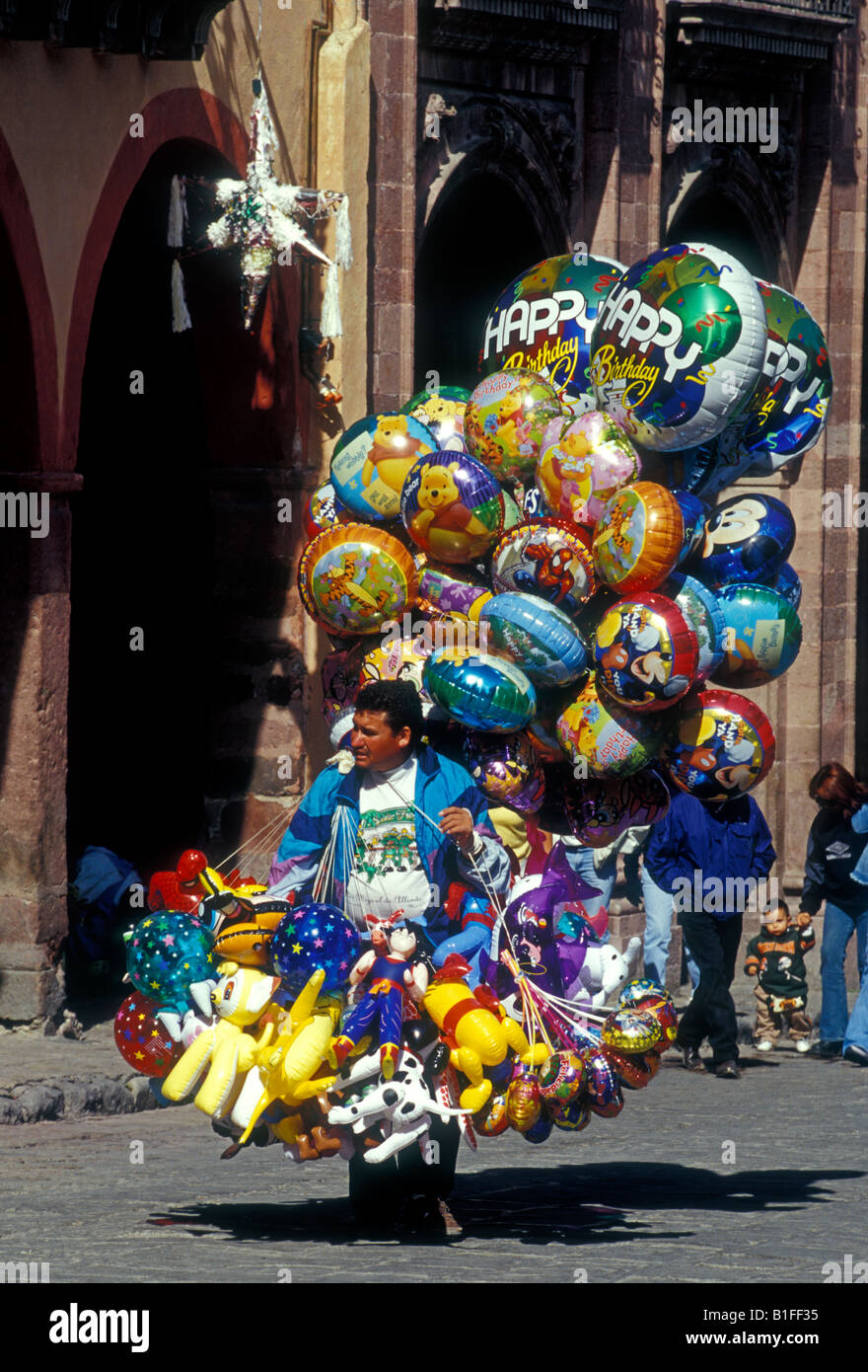 Mexican man, balloon vendor, town of San Miguel de Allende, Guanajuato State, Mexico Stock Photo