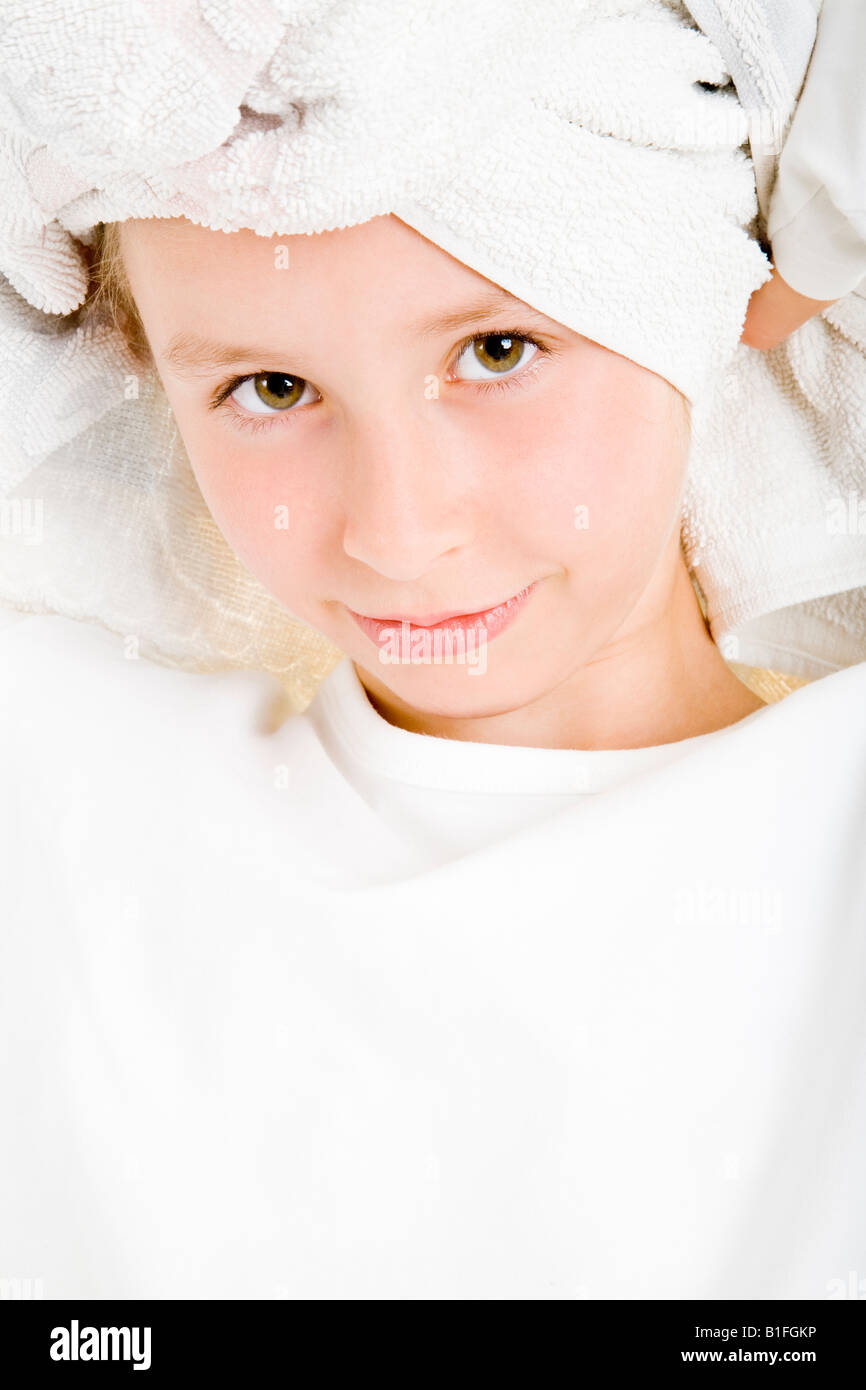 blonde girl with towel in the wet hair Stock Photo Alamy