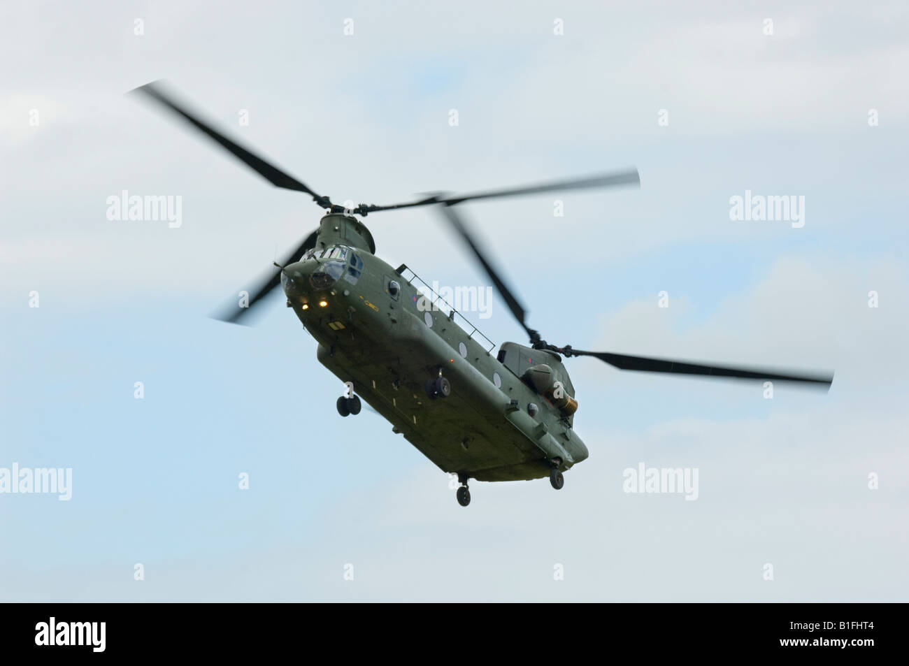 An RAF twin rotored Chinook transport helicopter in flight Stock Photo