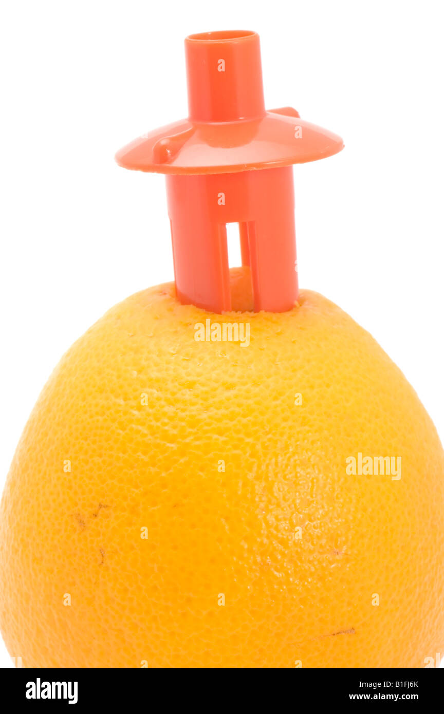 object on white kitchen utensil juicer with orange Stock Photo Alamy