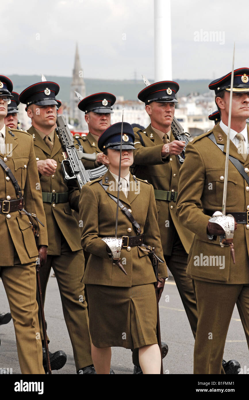 Small female Officer in the British Army marching in a welcome Home Parade Stock Photo