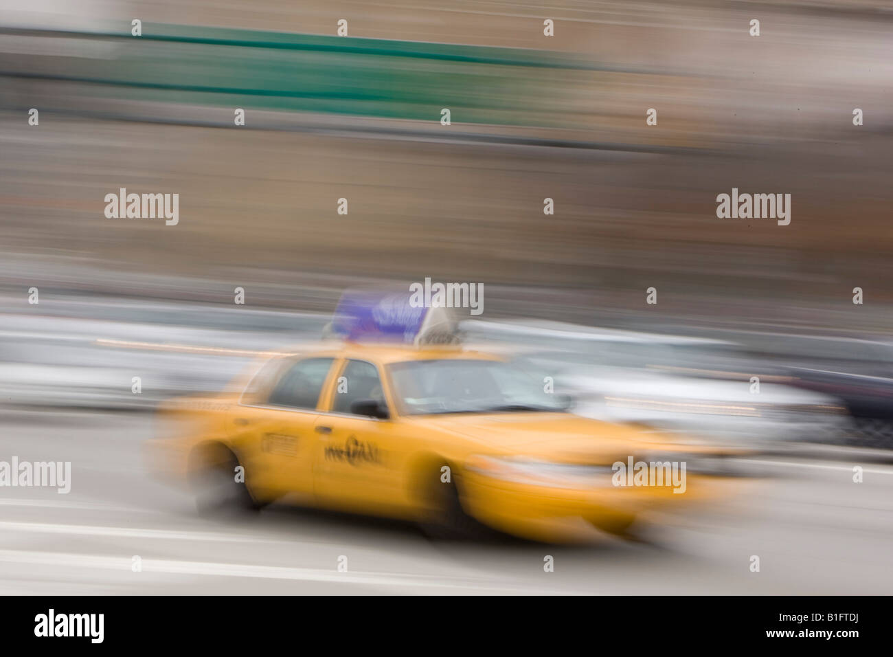 Blurry yellow cab in New York USA 7 April 2008 Stock Photo