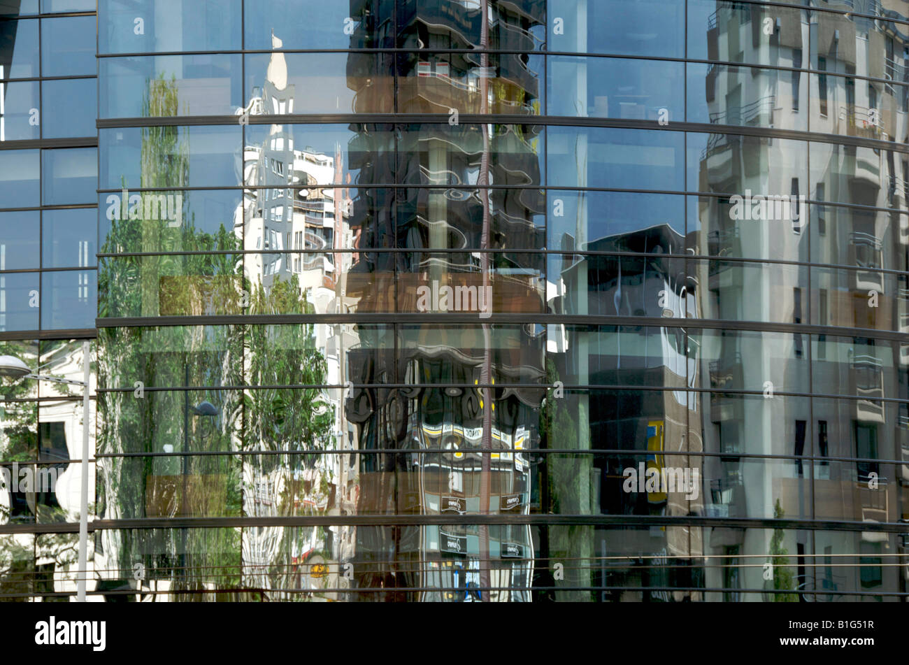 Reflections in office building windows in a city centre Stock Photo