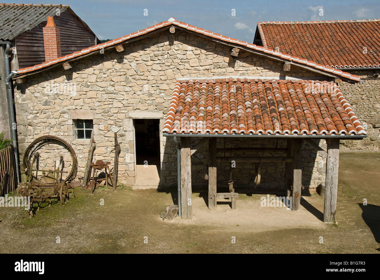 Stock photo of the old renovated blacksmiths building in the village of Montrol Senard Stock Photo