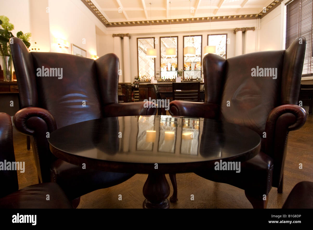 arm chairs in a bar gentlemans club Stock Photo