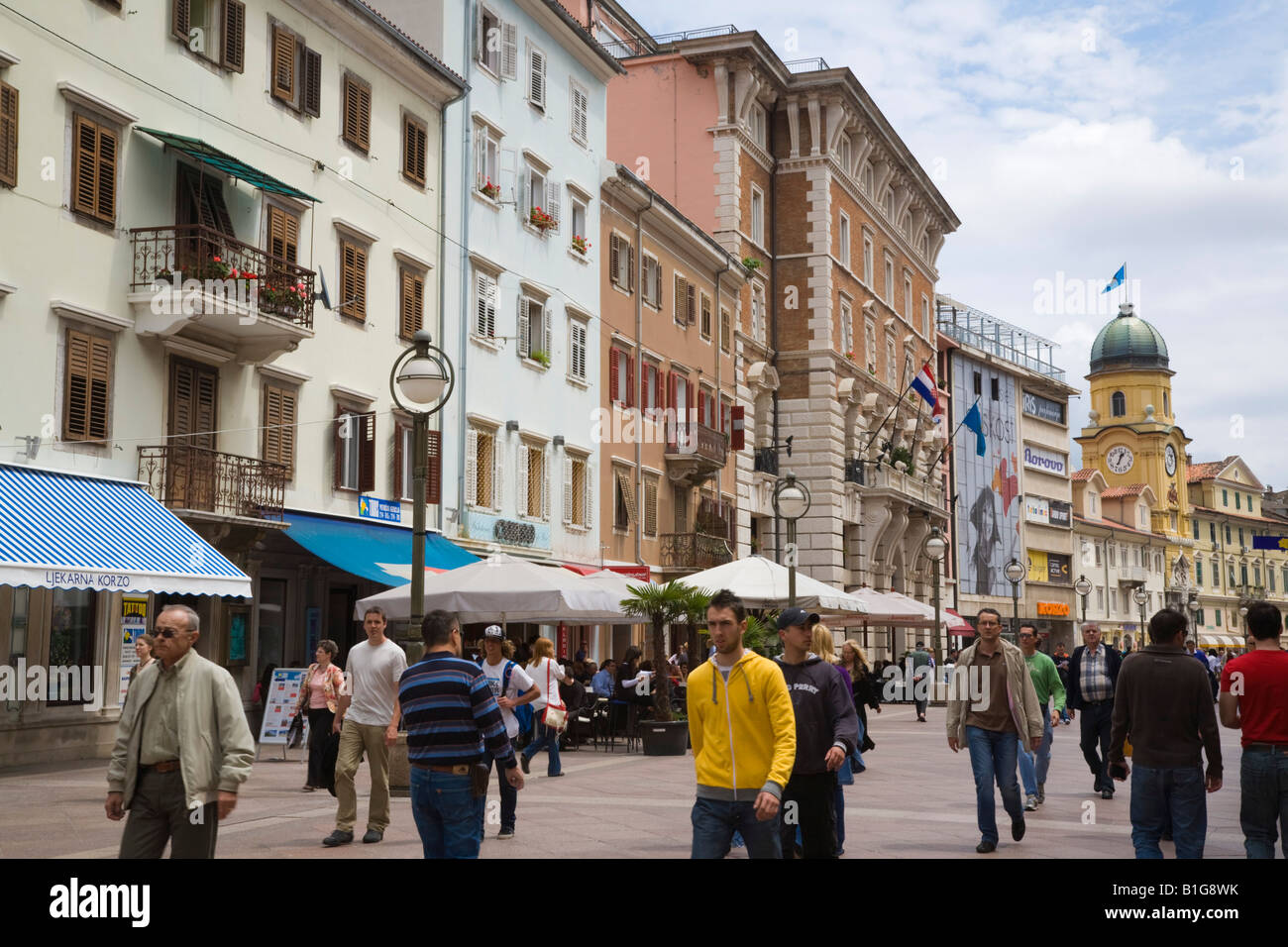 Rijeka Croatia Europe Busy pedestrianised Korzo Street with people and shops in old buildings in city centre Stock Photo