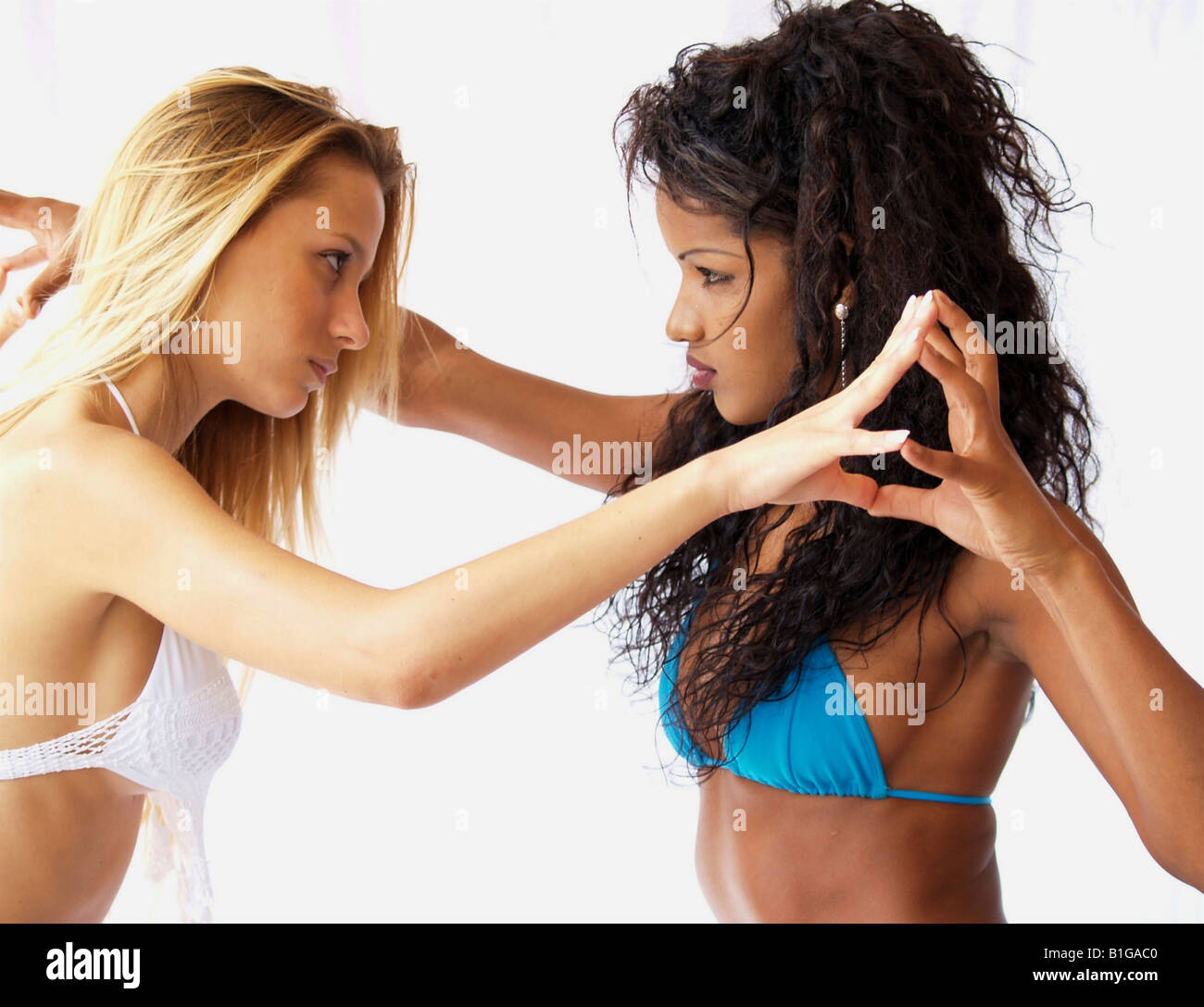 Side view of women fighting Stock Photo