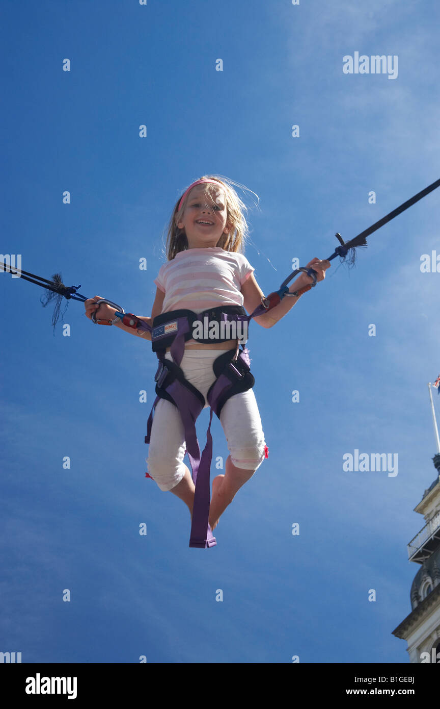 Small Child on Bungy Trampoline Dunedin Festival Octagon Dunedin South