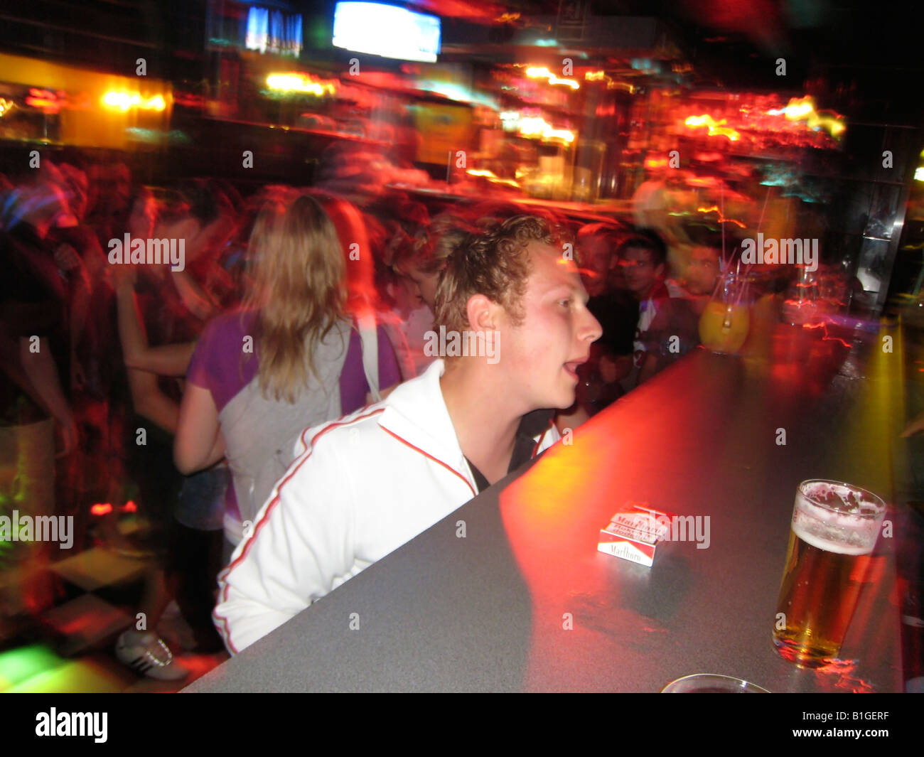young man ordering drink at the bar Stock Photo Alamy