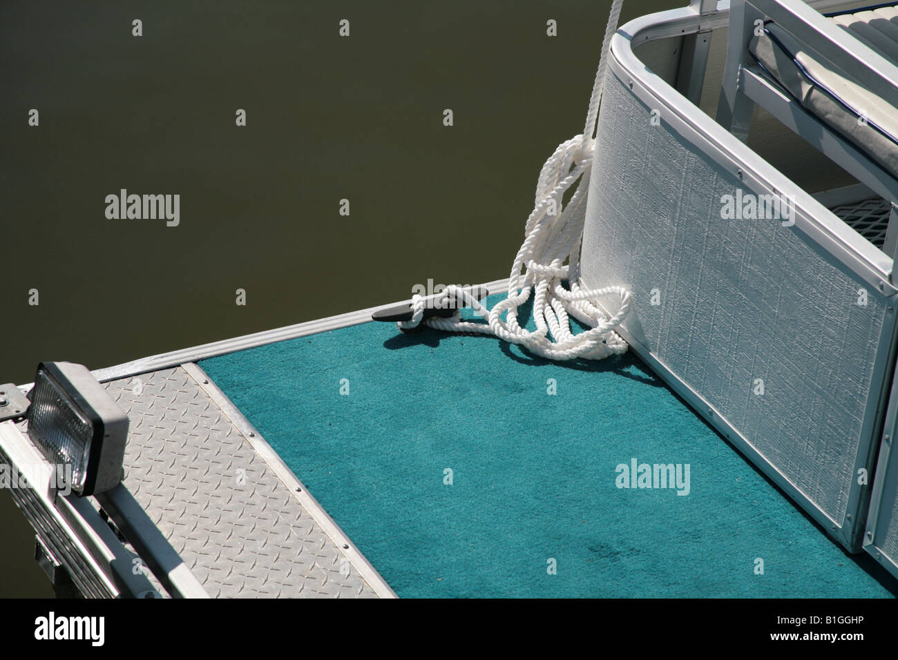 Boat deck with a white rope used to tie the boat Stock Photo Alamy