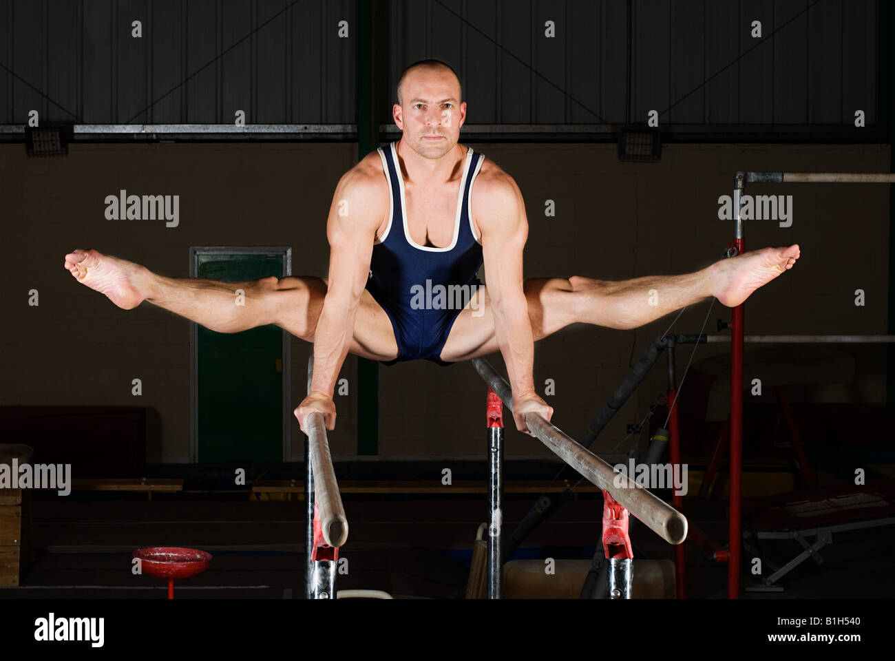 Gymnast on parallel bars Stock Photo Alamy