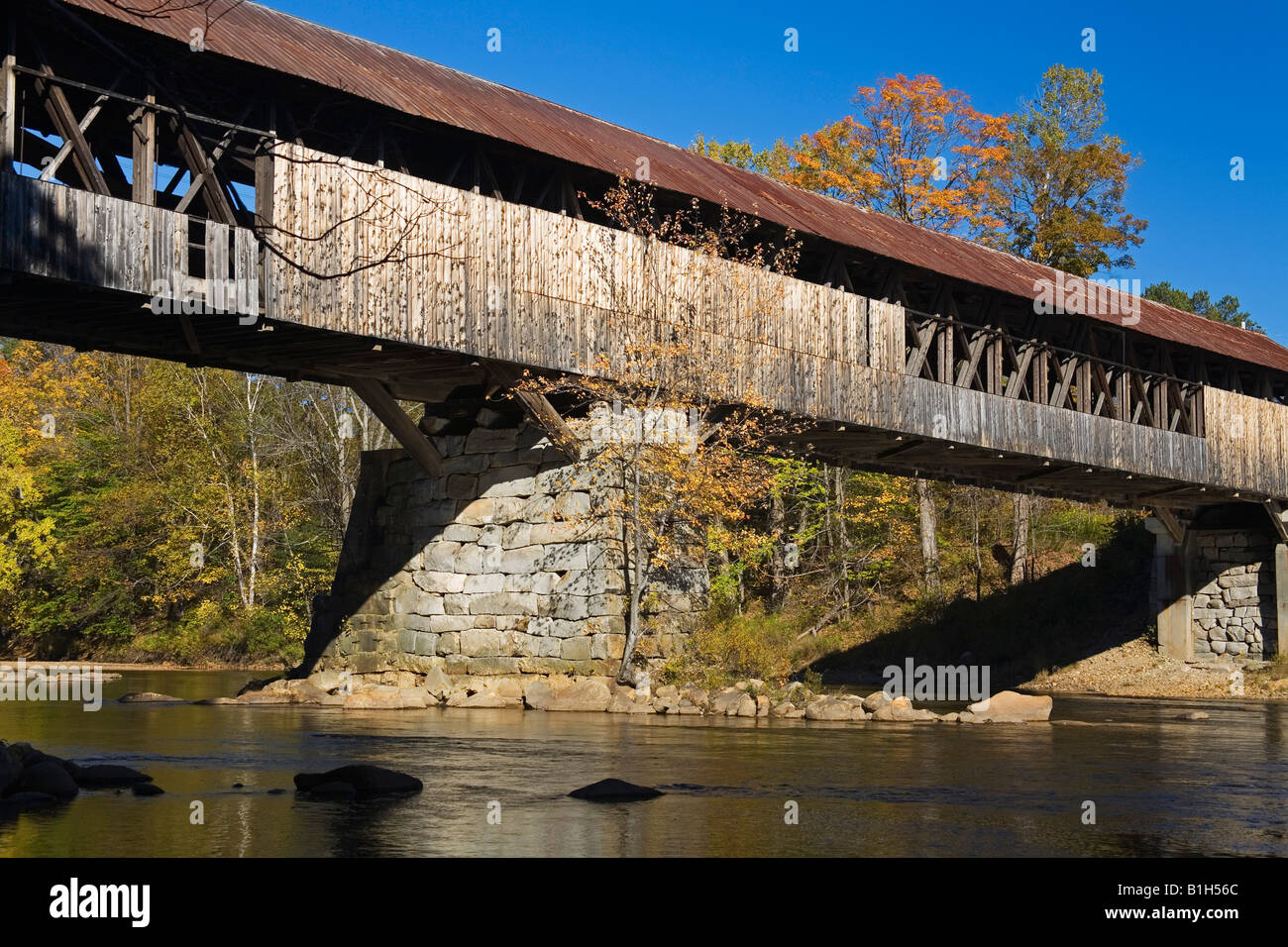 Covered bridge across a river, Blair Covered Bridge, Campton, New