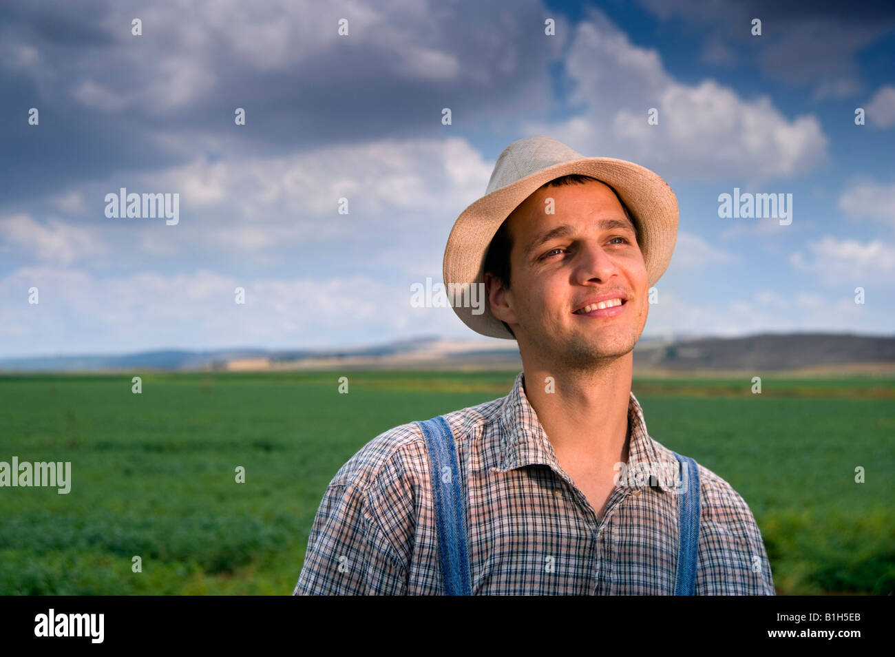 happy farmer in the fields Stock Photo - Alamy