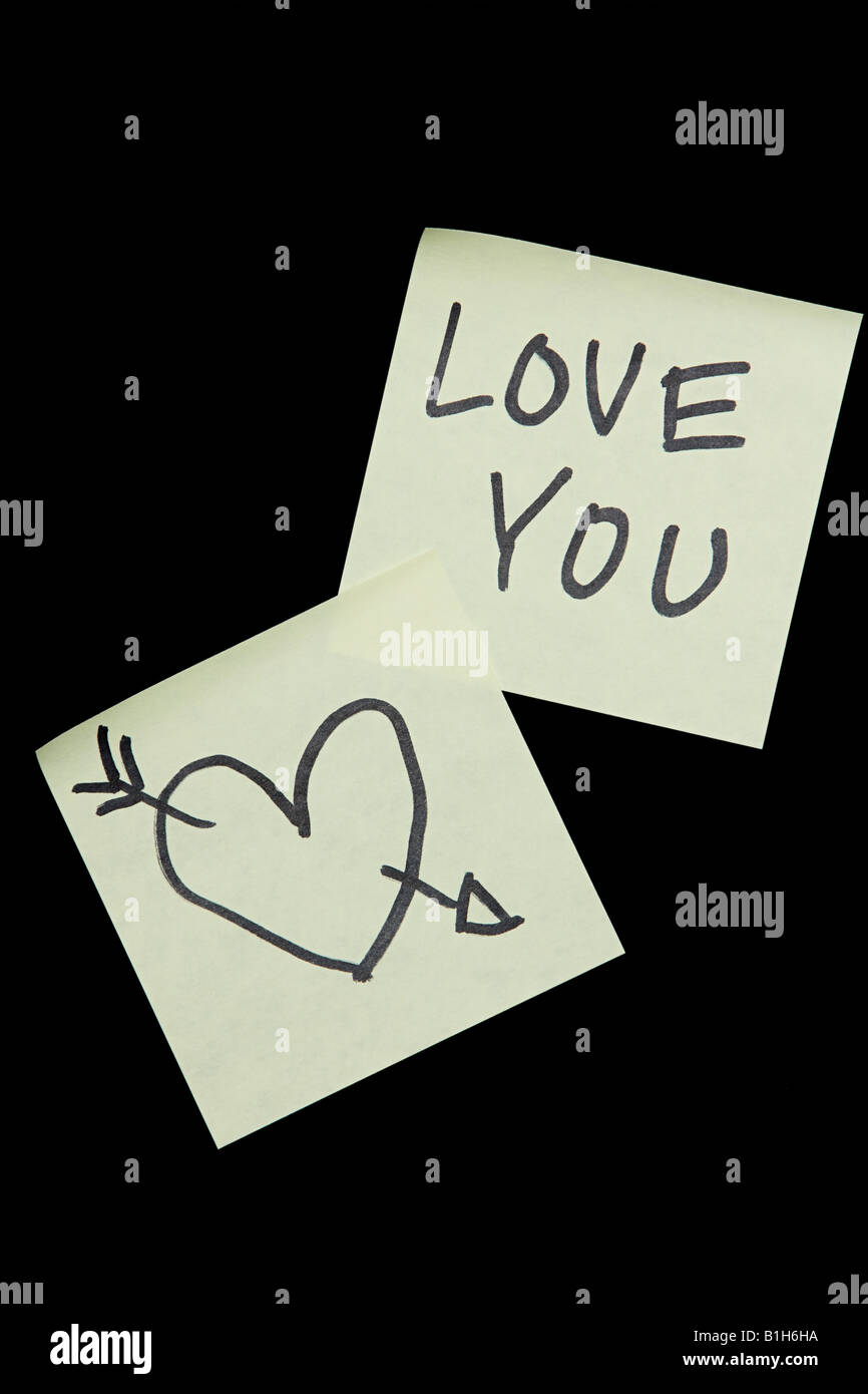 Adhesive notes with a heart and love you on them Stock Photo Alamy