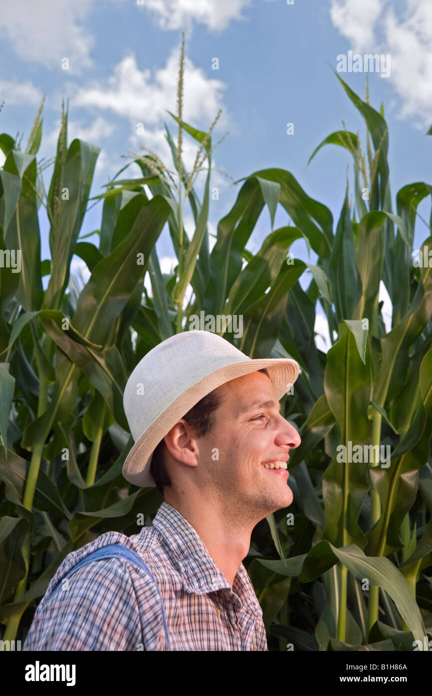 farmer in front of a corn field Stock Photo - Alamy