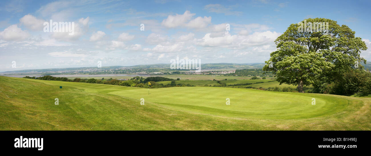 Golf Course putting green and sweeping fairway panoramic view vista of