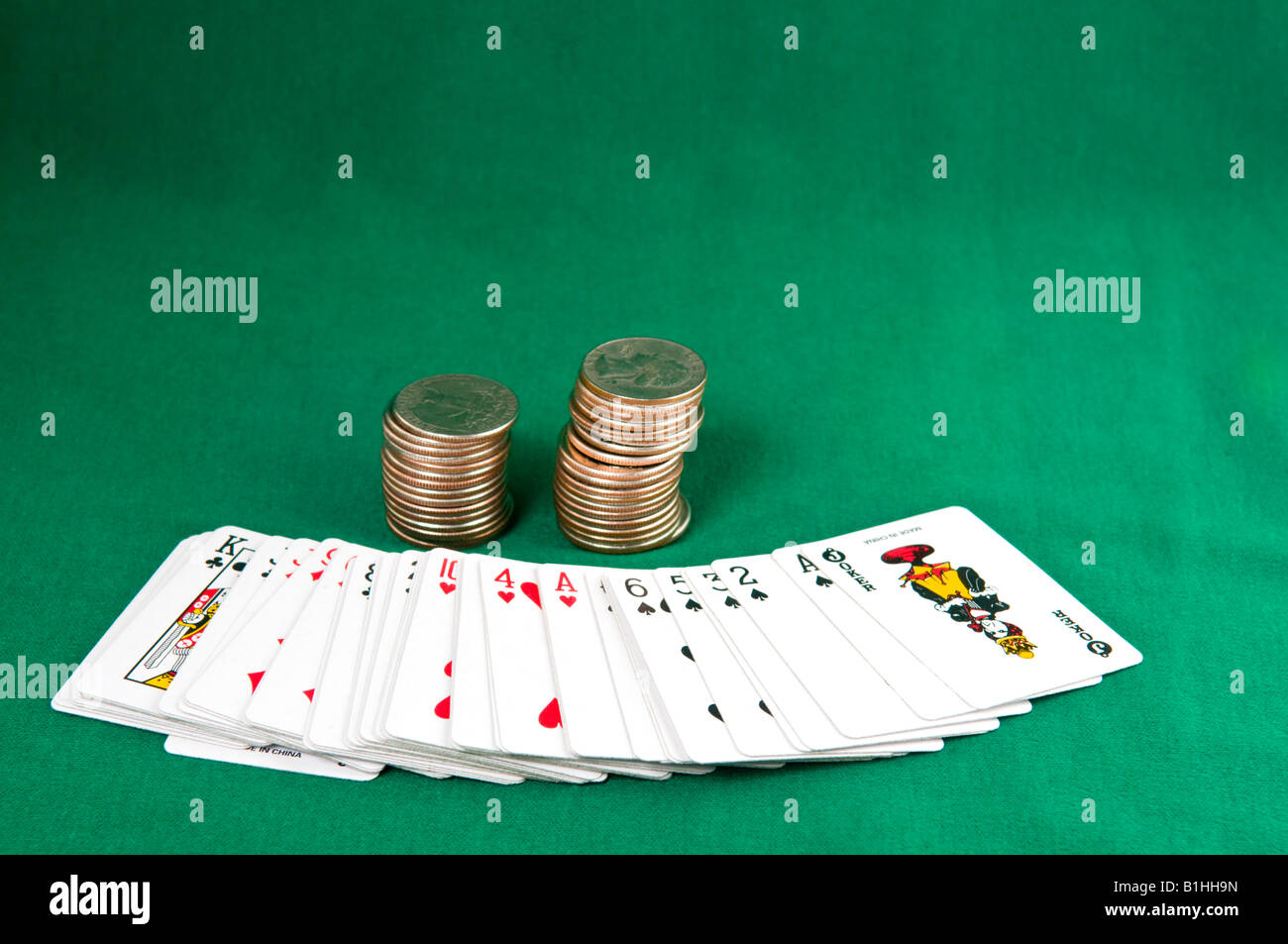 Gambling concept playing cards coins hi-res stock photography and images -  Alamy