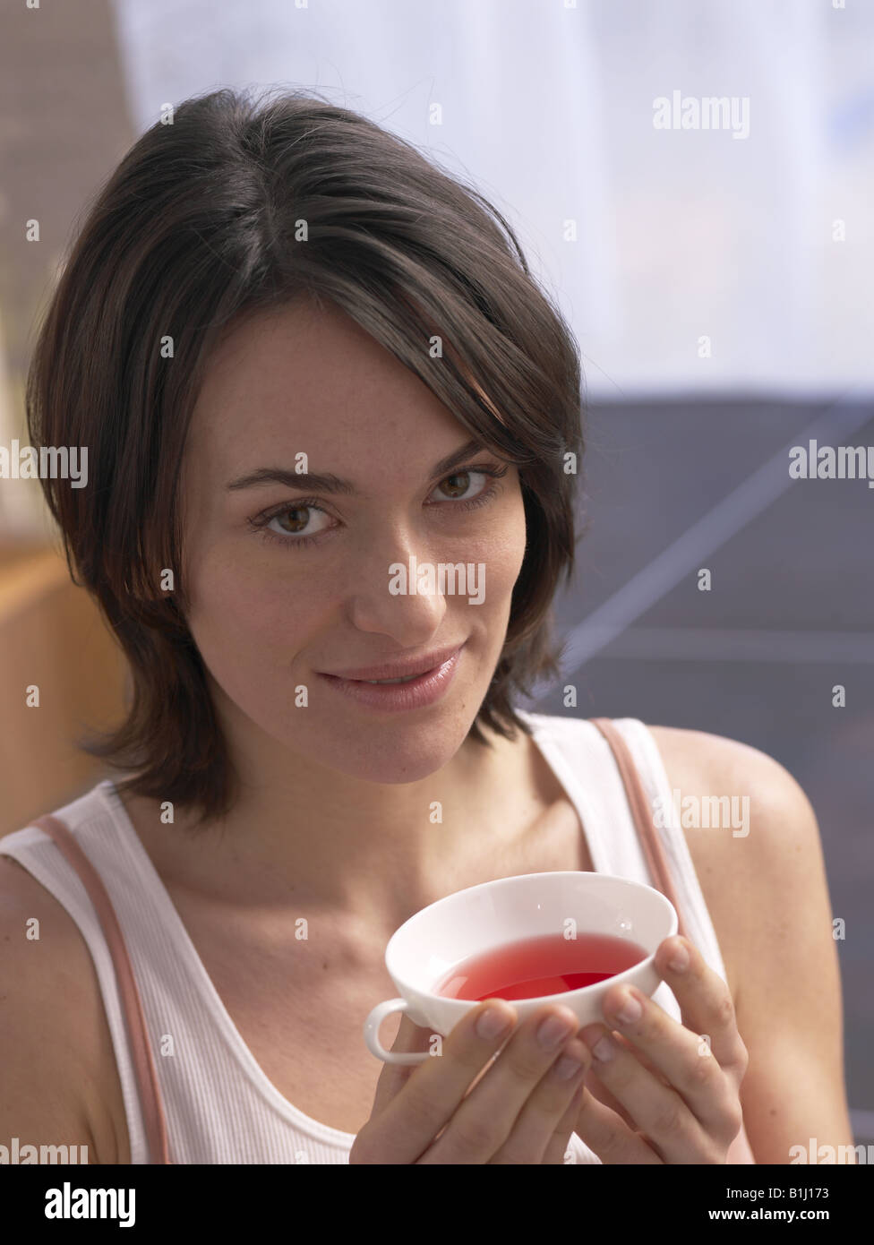 Frau mit einer Tasse Tee Stock Photo