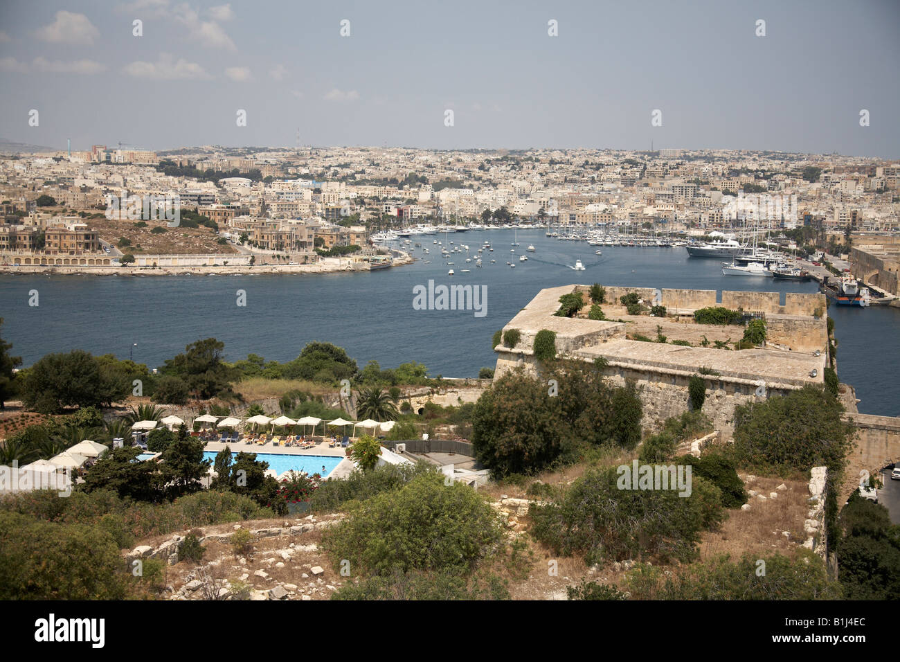 View north from St John Counterguard across harbour to Ta Xbiex and Manoel Island in Valetta or Valletta Malta Stock Photo