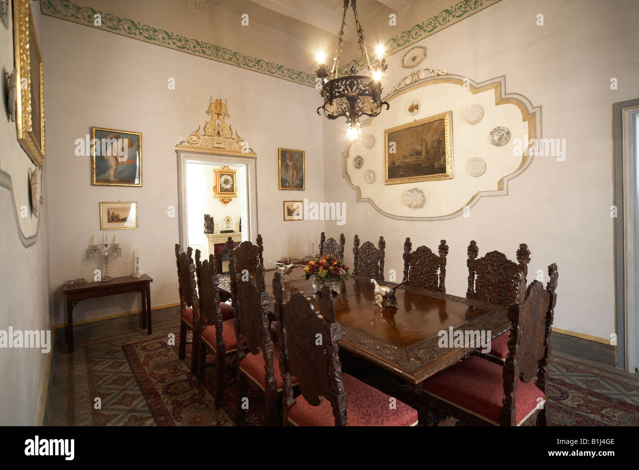 Dining Room large wooden table with chairs in Casa Rocca Piccola grand
