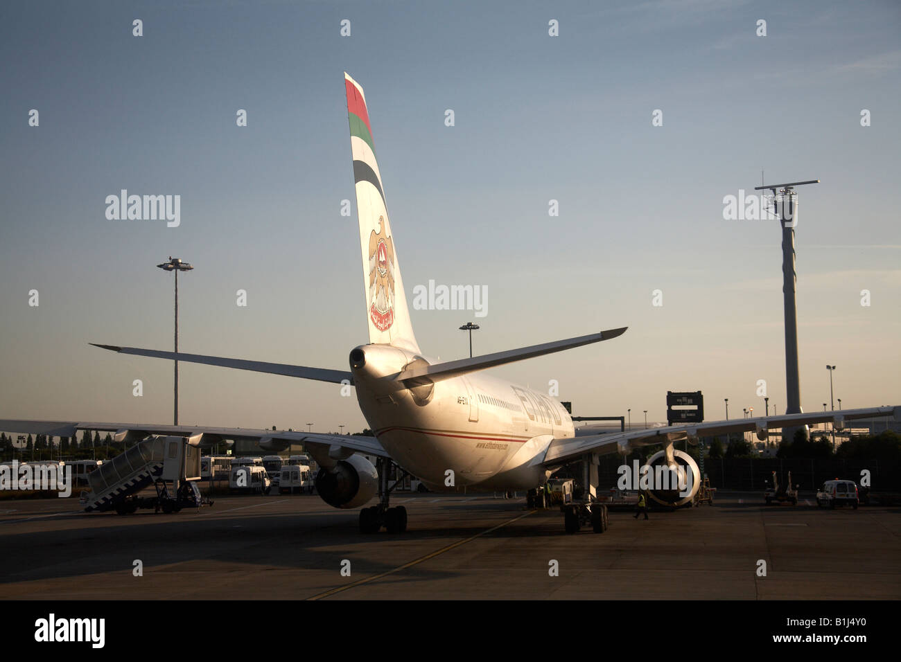 A6 EYX Etihad Airways Airbus A330 223 parked on apron at Heathrow Airport London TW6 England High level oblique Stock Photo