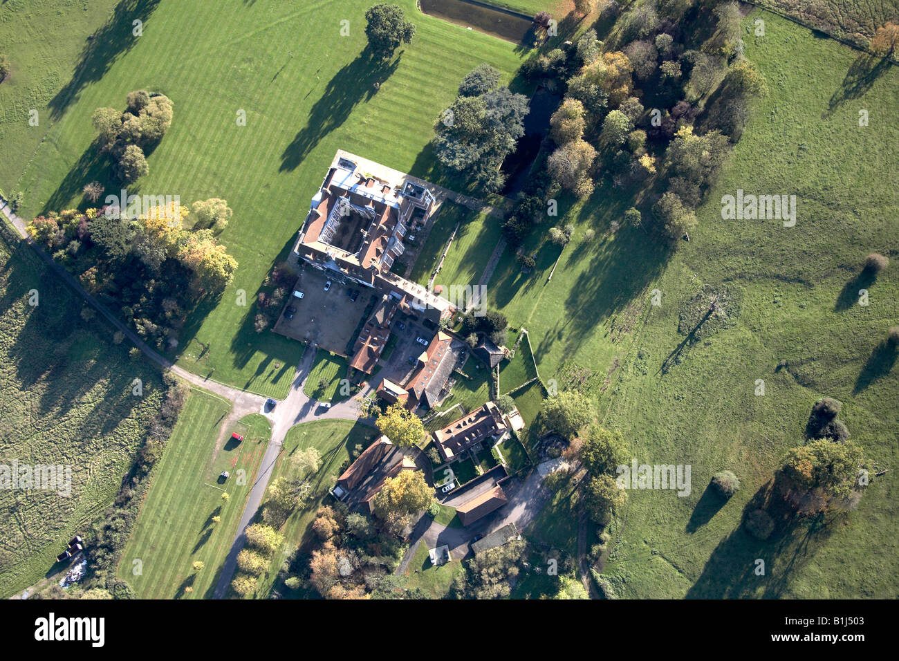 Aerial view south of Hill Hall and gardens trees with silhouette The