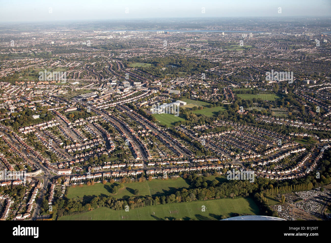 Aerial view north east of Brunswick Park Ashmole School suburban houses green land Southgate and Oakwood London N14 N21 England Stock Photo