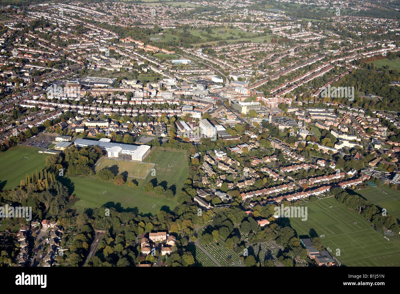Aerial view north east of Ashmole School Southgate Cricket Club Ground cemetery and suburban houses Southgate London N14 UK Stock Photo