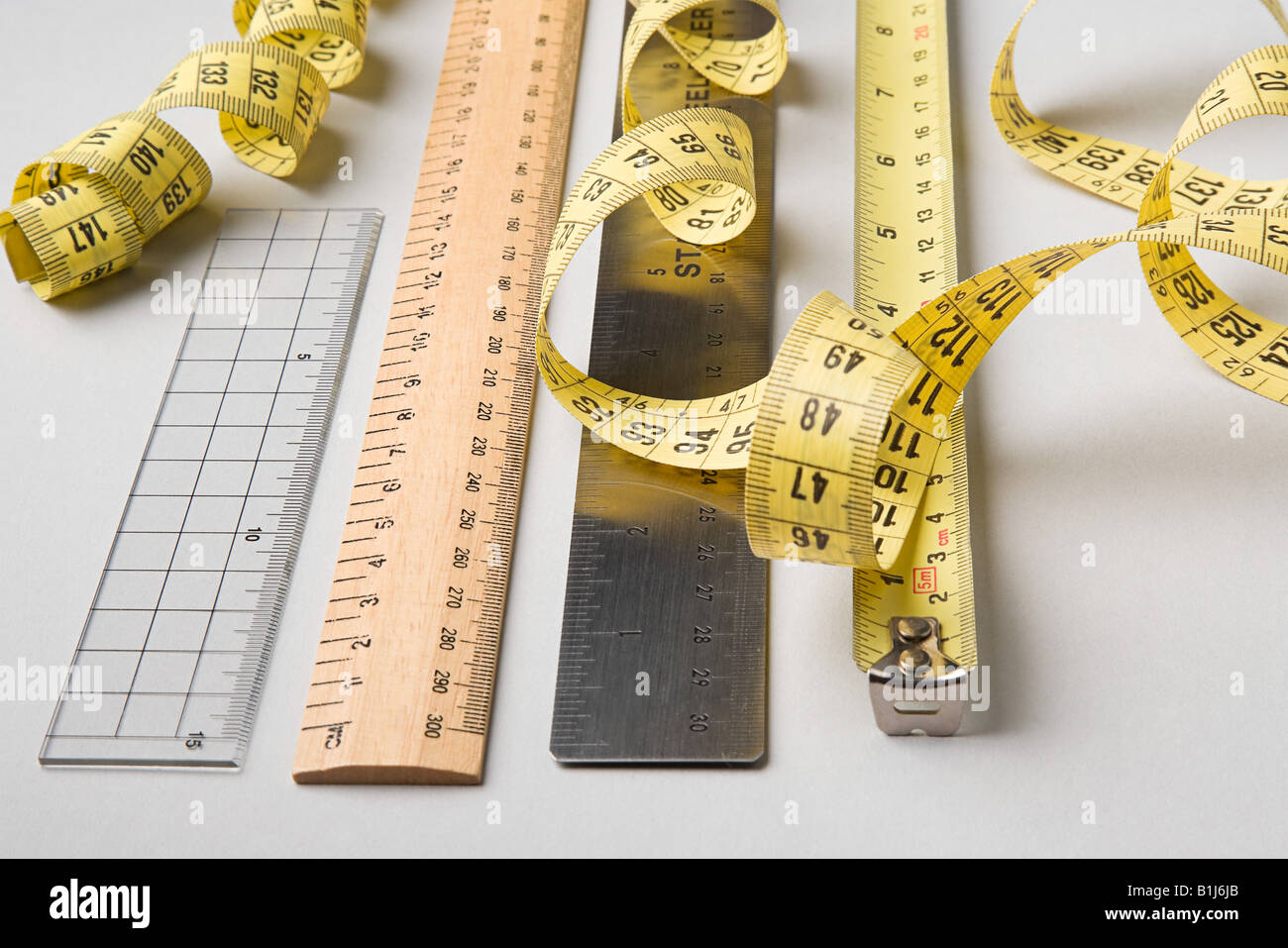 Fabric Measuring Tape In Yellow Stock Photo - Download Image Now