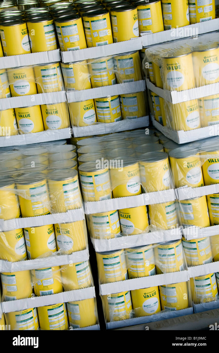 packs of Cheap discount bargain generic own yellow label  Morrisons tins of baked beans, UK Stock Photo