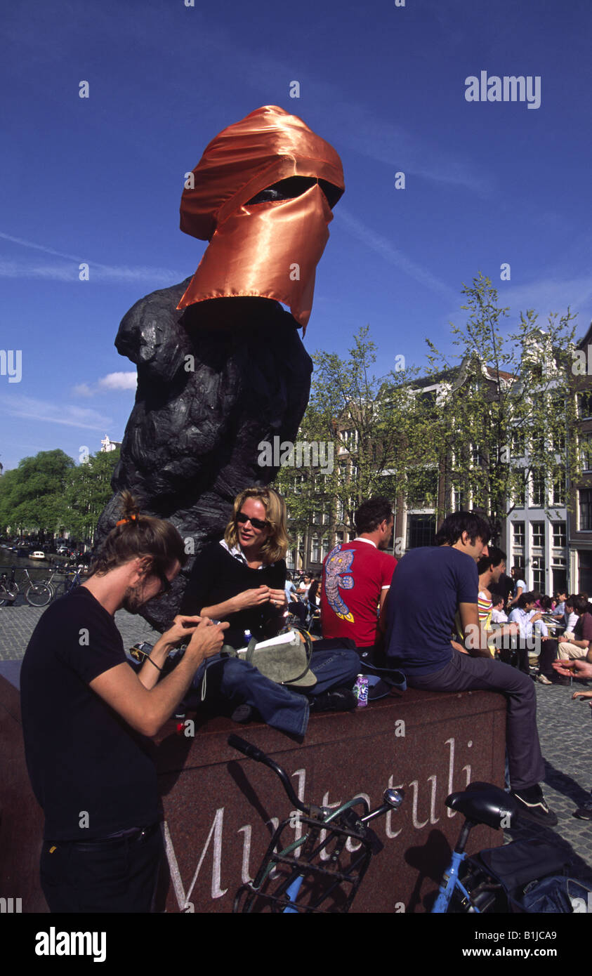 Multatuli statue covered with orange Muslim 'Niqab' veil the year after the murder of Theo Van Gogh. Amsterdam, Netherlands. Stock Photo