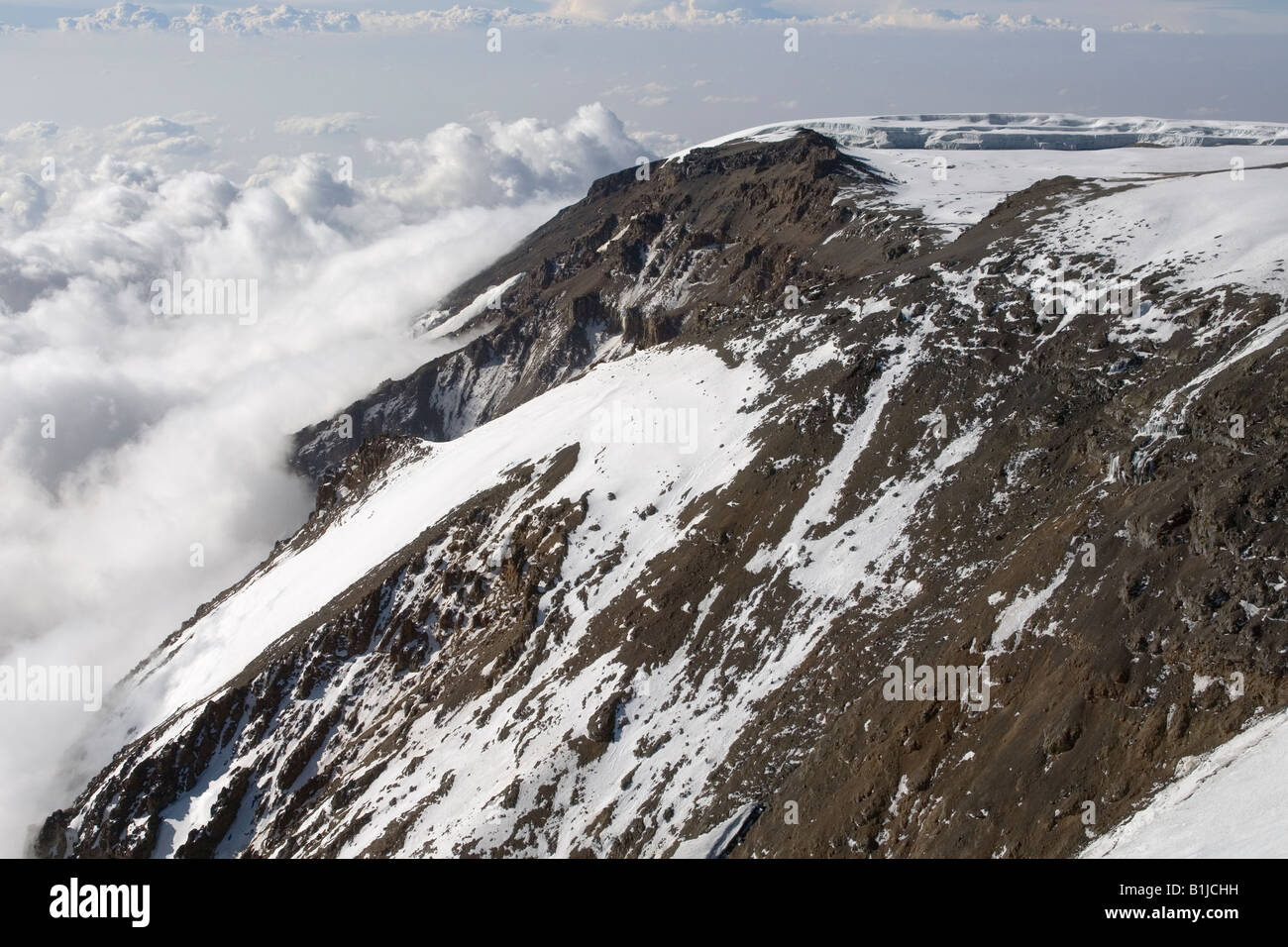 Aerial view of Kilimanjaro 19335ft / 5895m  - Diamond Glacier (low left),  Western Breach and Northern Ice field (top right) Stock Photo