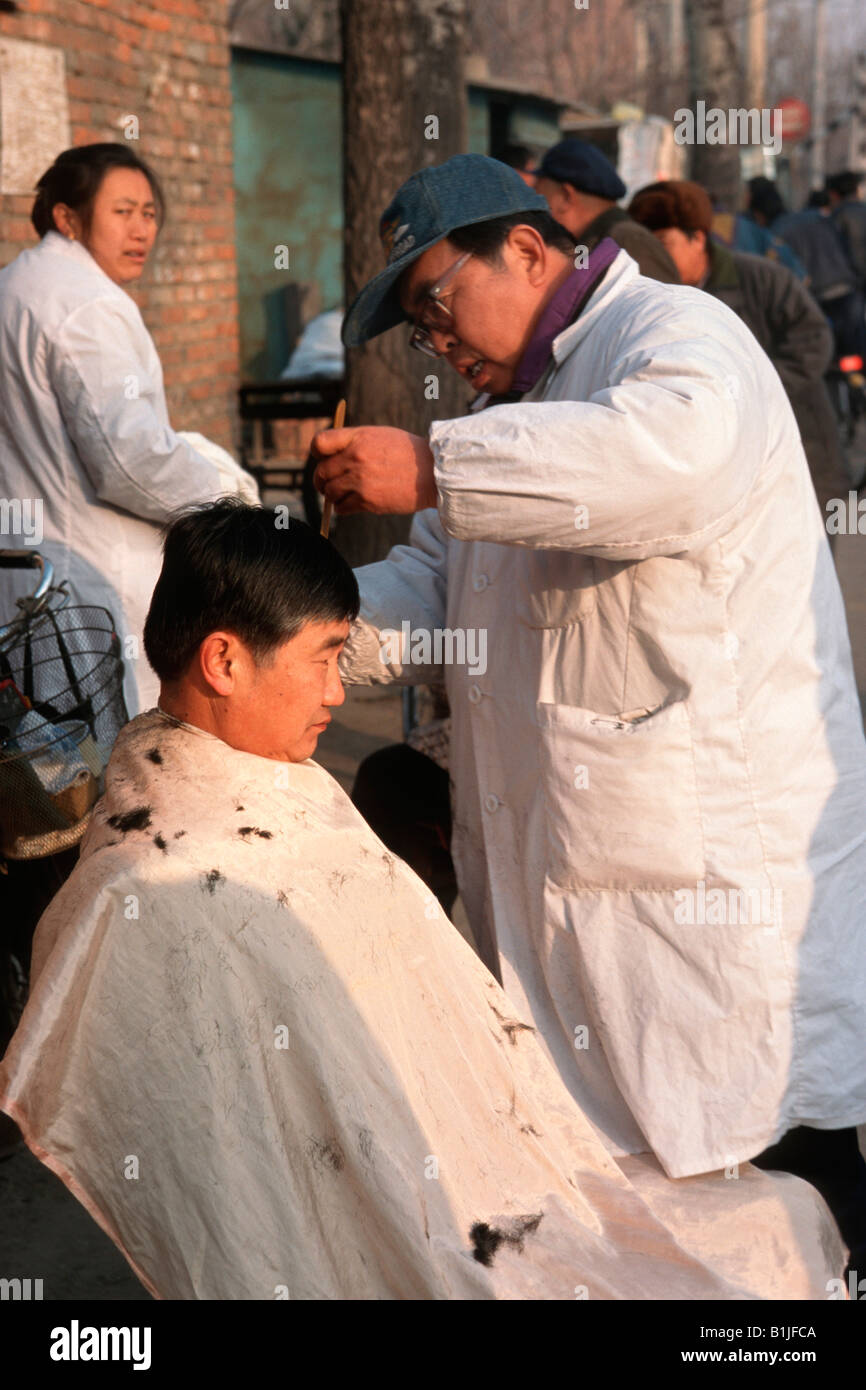 barber in a street of  Beijing, China, Beijing Stock Photo