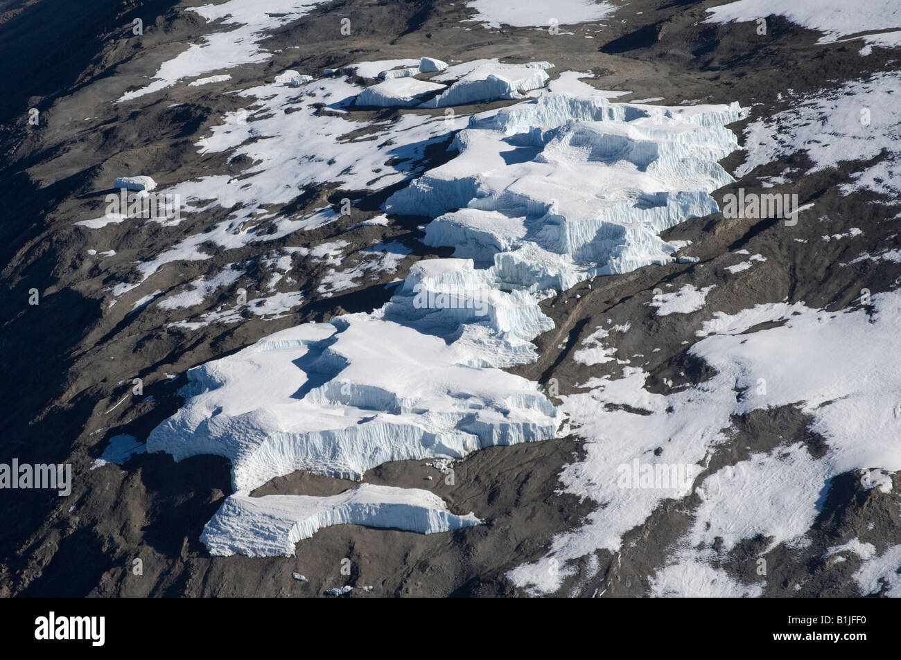 Aerial view of Kilimanjaro 19335 ft  / 5895 m - Spectacular ice cliffs of the Eastern Ice field Stock Photo