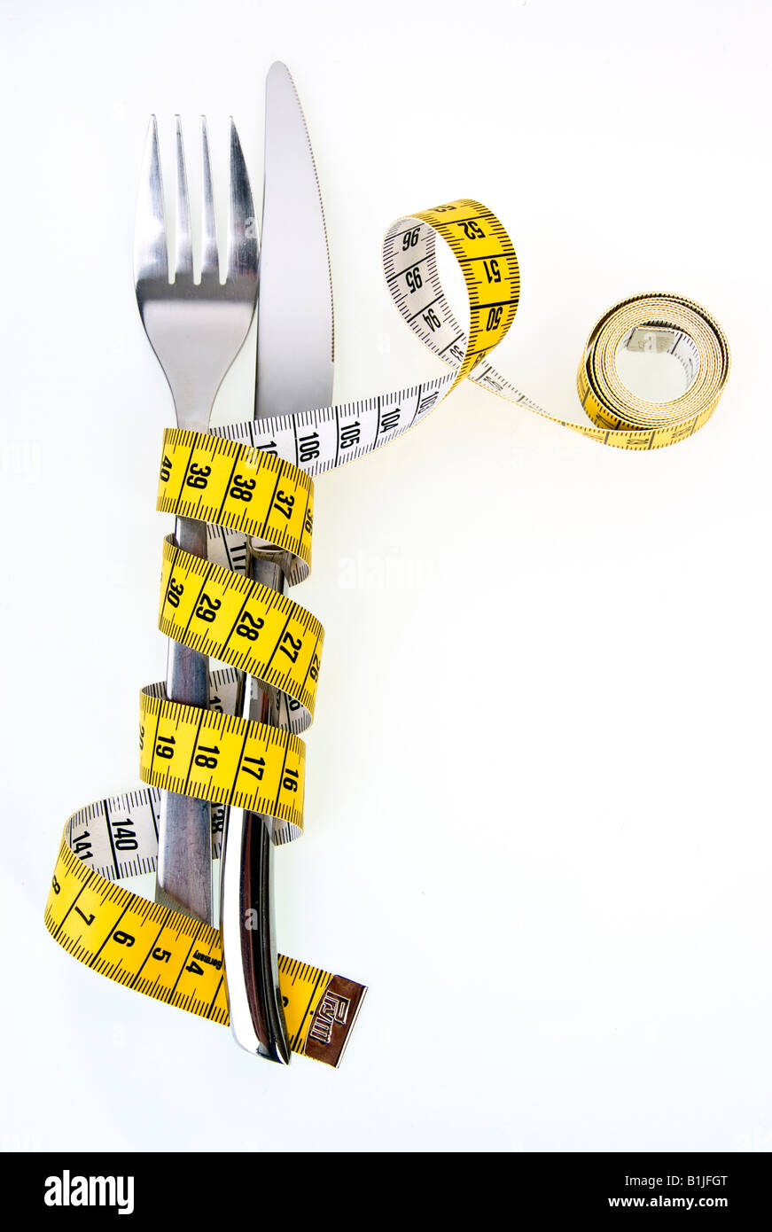 symbolic for diet, knife and fork with tape measure Stock Photo Alamy