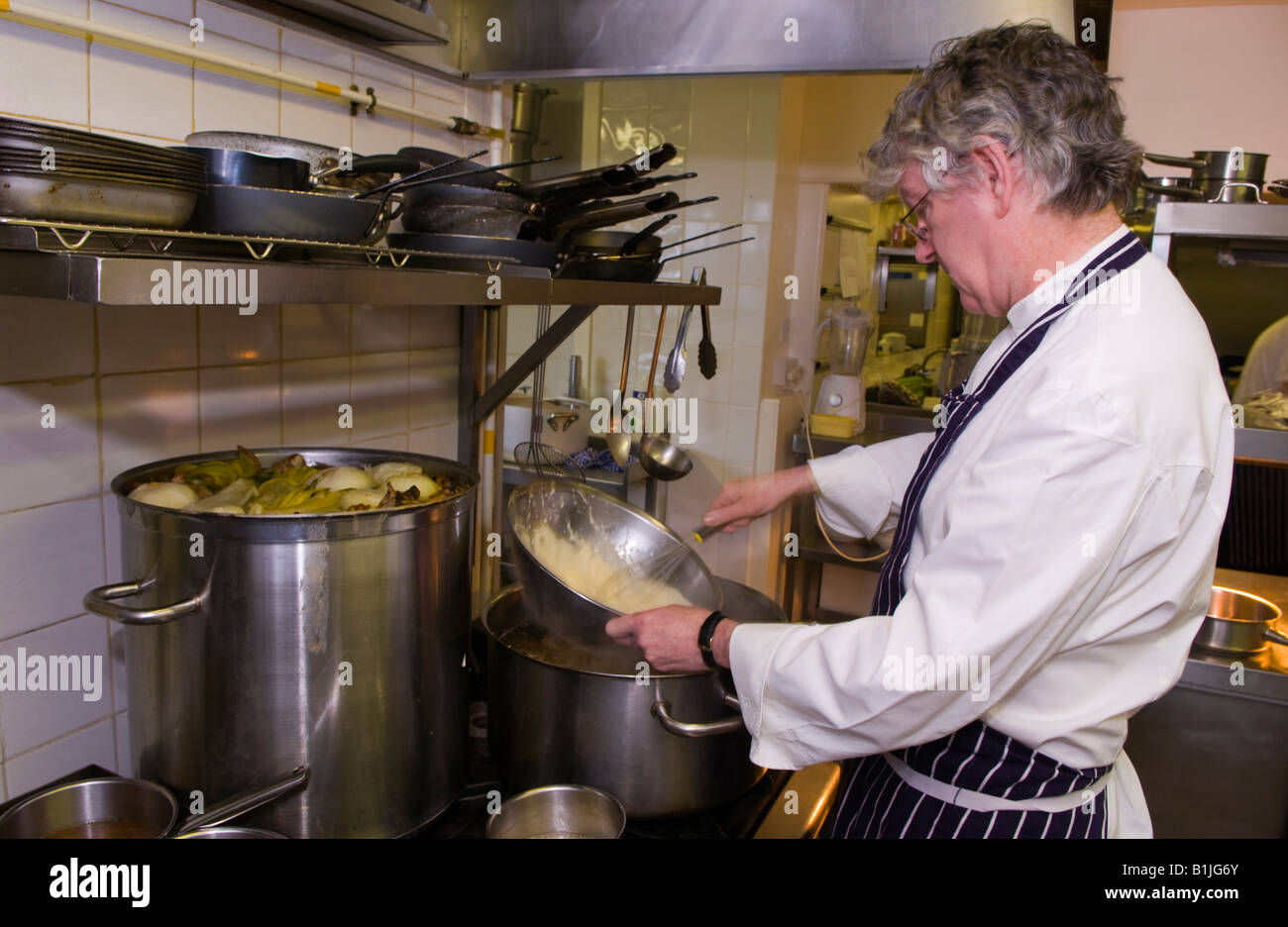 Shaun Hill chef and joint owner of The Walnut Tree Restaurant Llanddewi Skirrid Abergavenny Monmouthshire pictured in kitchen Stock Photo