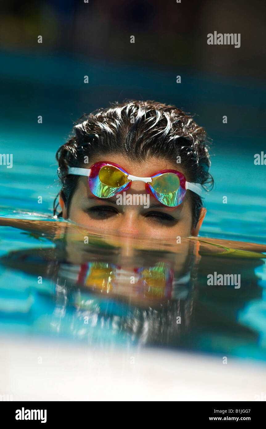 girl with diving goggle in swimming pool Stock Photo Alamy