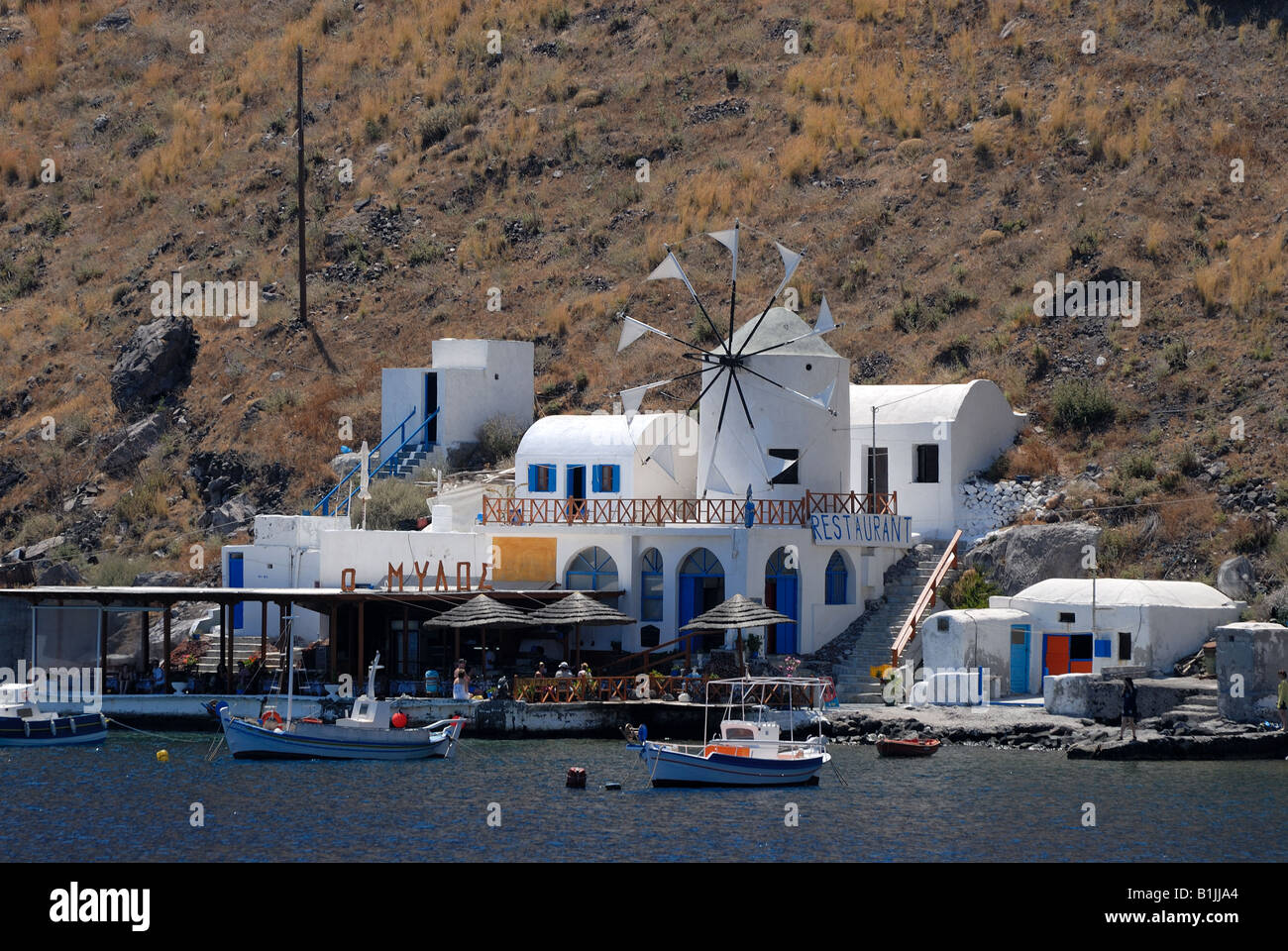 Restaurant on the island Thirassia near Santorini, Greece Stock Photo