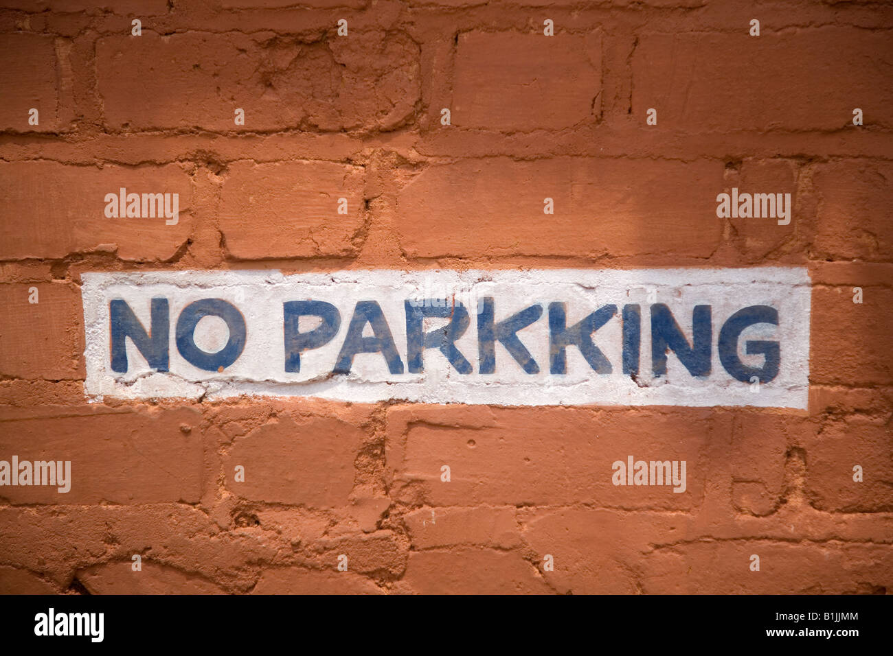 A 'No Parkking sign' at Alappuzha Beach in Kerala, India. Parking is spelled incorrectly. Stock Photo