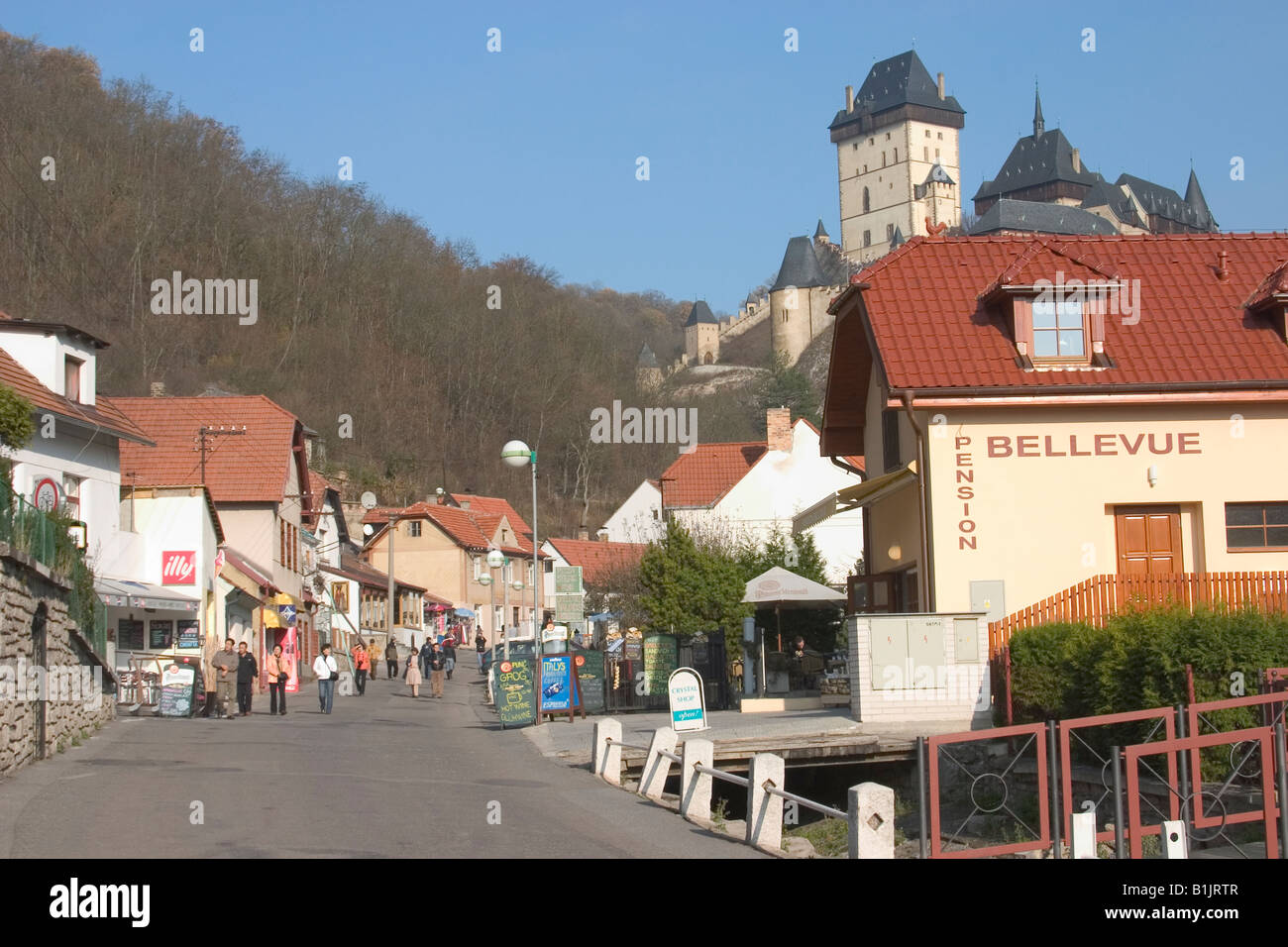 A street scene in Karlstein, near Prague, in Czech Republic, showing Karlstein Castle. Stock Photo